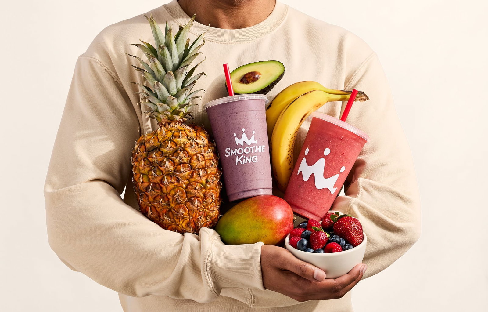 Man with fruit and smoothies