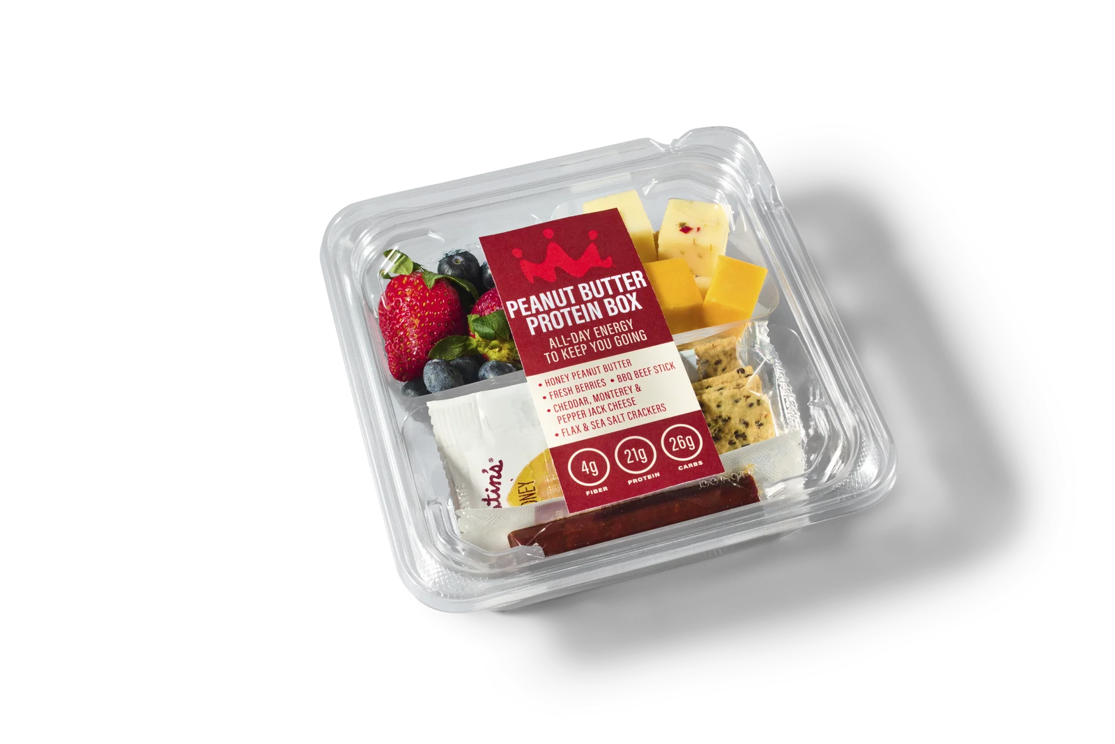 Peanut butter protein box with berries, cheese, crackers, and a beef stick from Smoothie King